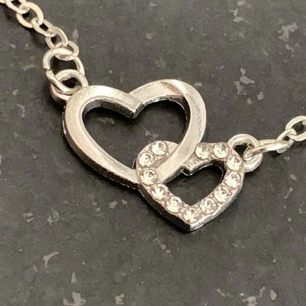 Interlocking Double Hearts Silver Tone Necklace with Rhinestones